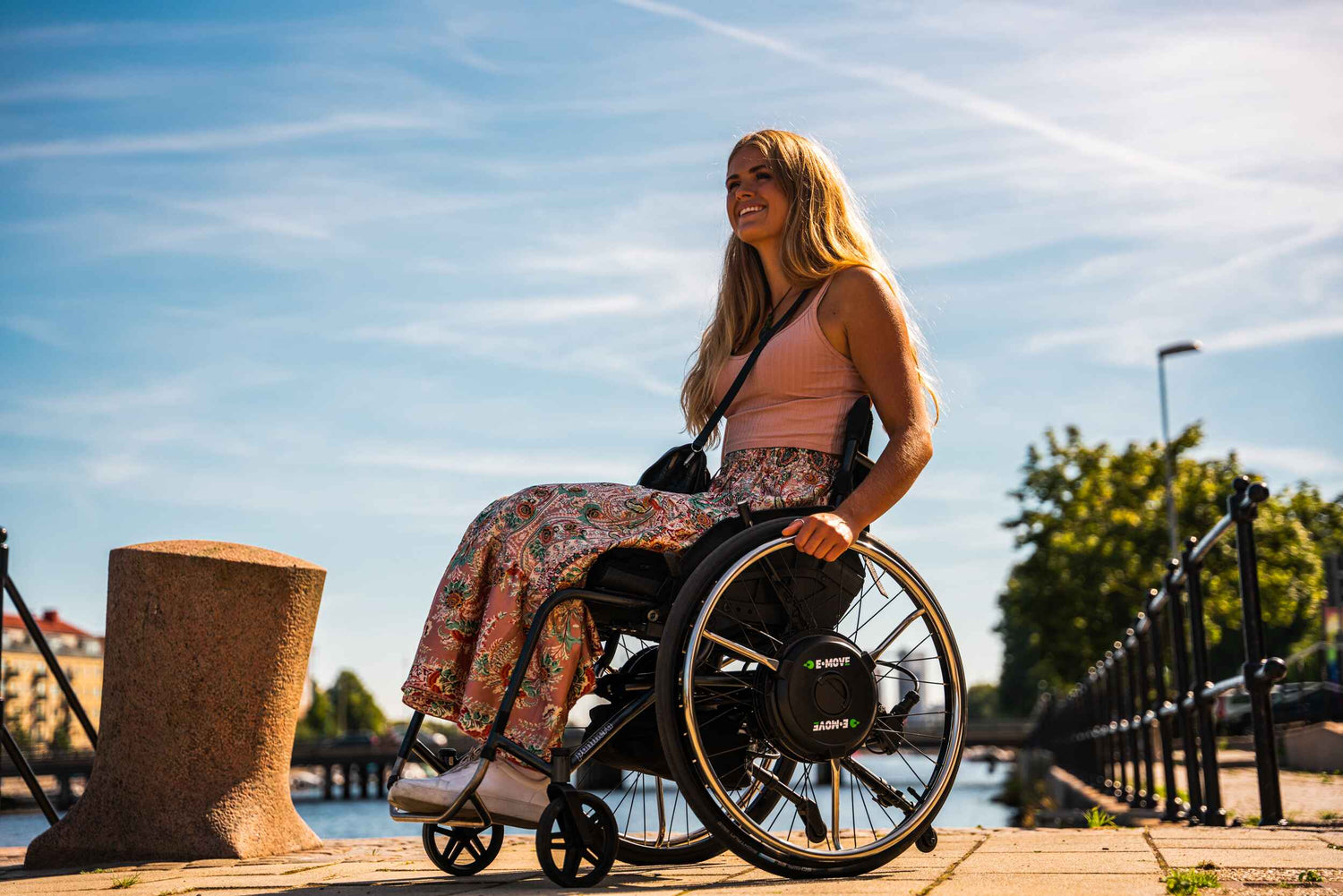 Decon E-Move Blackline - Hub-Mounted power assist device for manual wheelchairs. Available from Beyond Mobility.