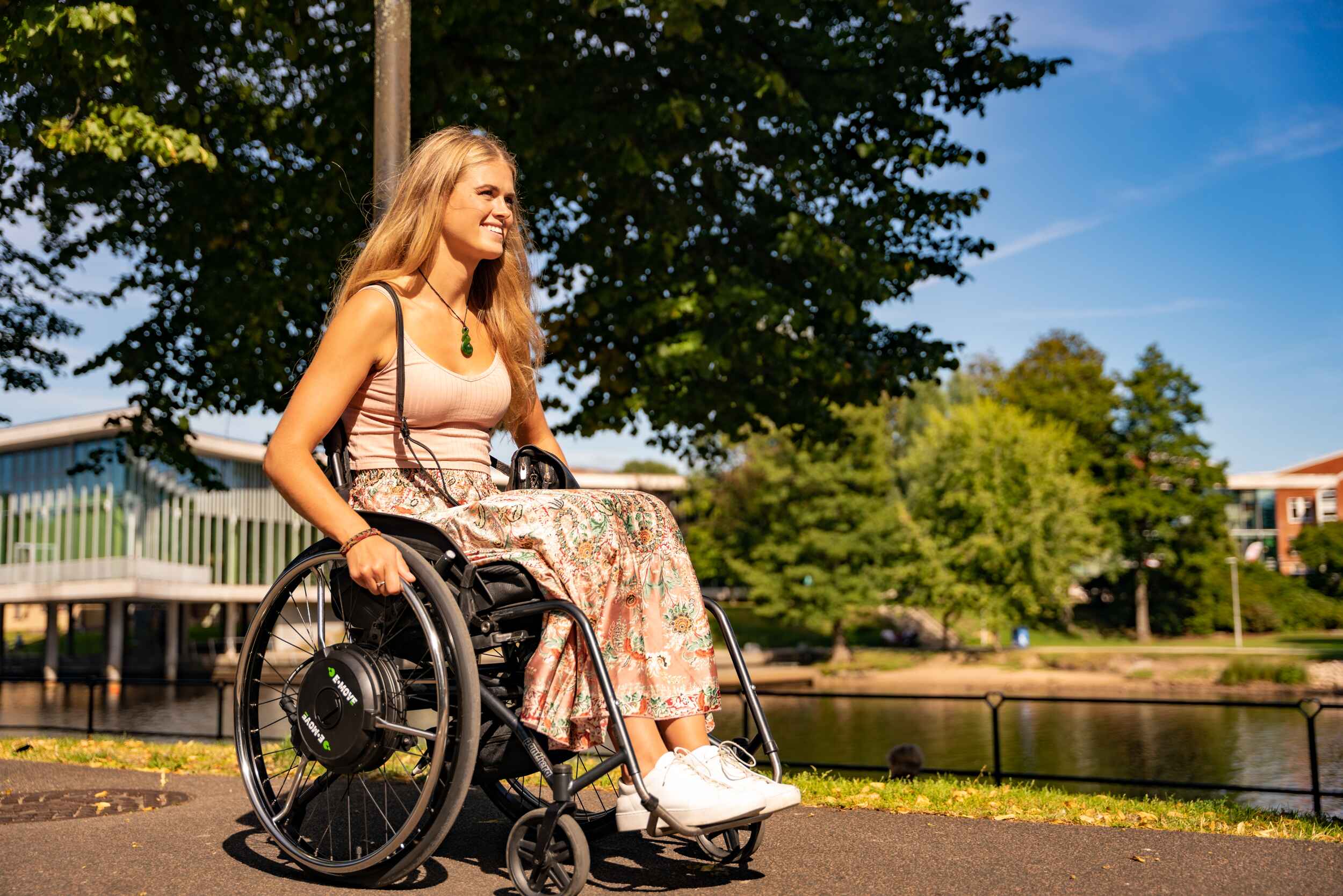 Decon E-Move Blackline - Hub-Mounted power assist device for manual wheelchairs. Available from Beyond Mobility.