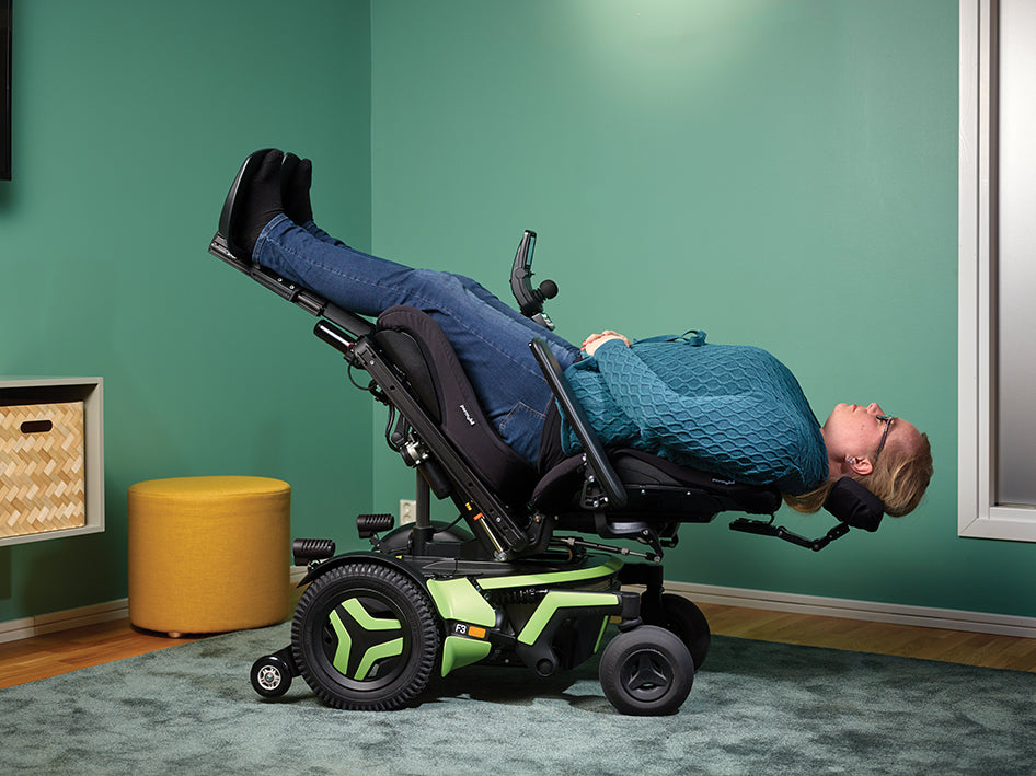 The Permobil F3 Corpus Powered Wheelchair in Trendelenburg to help with Edema. Available from Beyond Mobilty.